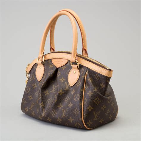 authentic tivoli pm louis vuitton|louis vuitton tivoli pm size.